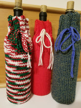 Load image into Gallery viewer, Why spend $5-7 dollars on a paper gift bag that gets thrown out right away? This knitted gift bag is washable, reusable, and can help keep your adult beverage cool if you're taking it to a picnic or outdoor party.  Other colors are available or contact Cozy Up! by Claire to order your custom colors. Email: CozyUpByClaire@gmail.com