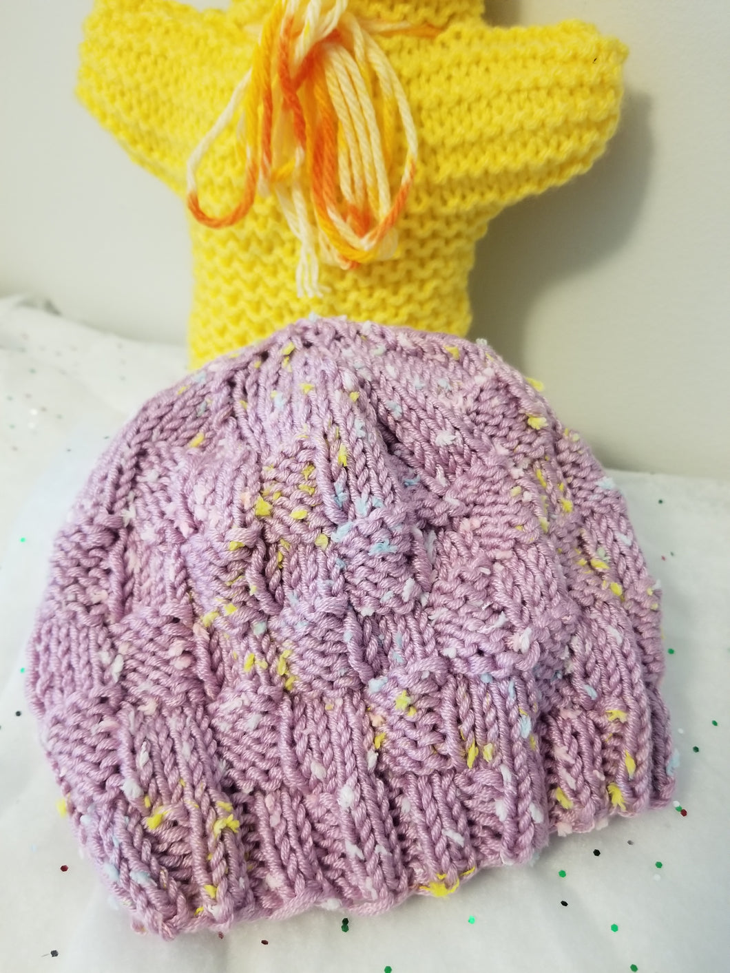 Your little one will look adorable in this baby hat, perfect for 6 to 9 months. Crafted with a classic basketweave design and available in many colors, it's great for any occasion and makes a delightful gift. Keep your baby snug and stylish in this quality beanie for just $17.  Yarn is machine wash & dry. Contact CozyUpByClaire@gmail.com to order custom colors