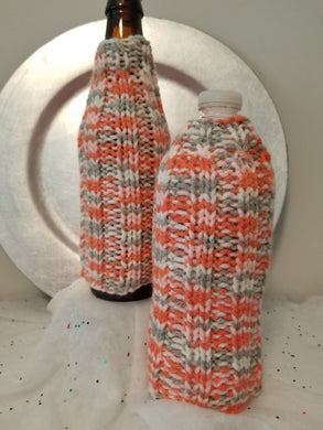 Classic Bottle Cozies fit glass or plastic bottles. Knit in a traditional ribbed style. $5 each in many different colors.  Check out the rest of the site for other patterns. Or if you are looking for a custom color or style, contact me at CozyUpByClaire@gmail.com. I'll be happy to work with you on your custom order