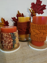 Load image into Gallery viewer, These decorative cozies are to be used with flameless candles only and are made to fit a 3 inch round candle. With the same candle, change the cozy for various holidays &amp; seasons or match your room decor!  Two individual sizes and many different colors available - Large is approximately 5 inches tall, small is approximately 3 inches tall  Use the code &quot;Candle Cozy Set&quot; at checkout to receive $1 off the purchase of two or more items.
