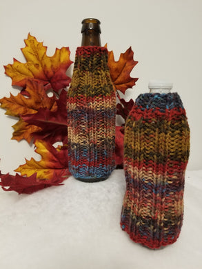 Classic Bottle Cozies fit glass or plastic bottles. Knit in a traditional ribbed style. $5 each in many different colors.  Check out the rest of the site for other patterns. Or if you are looking for a custom color or style, contact me at CozyUpByClaire@gmail.com. I'll be happy to work with you on your custom order