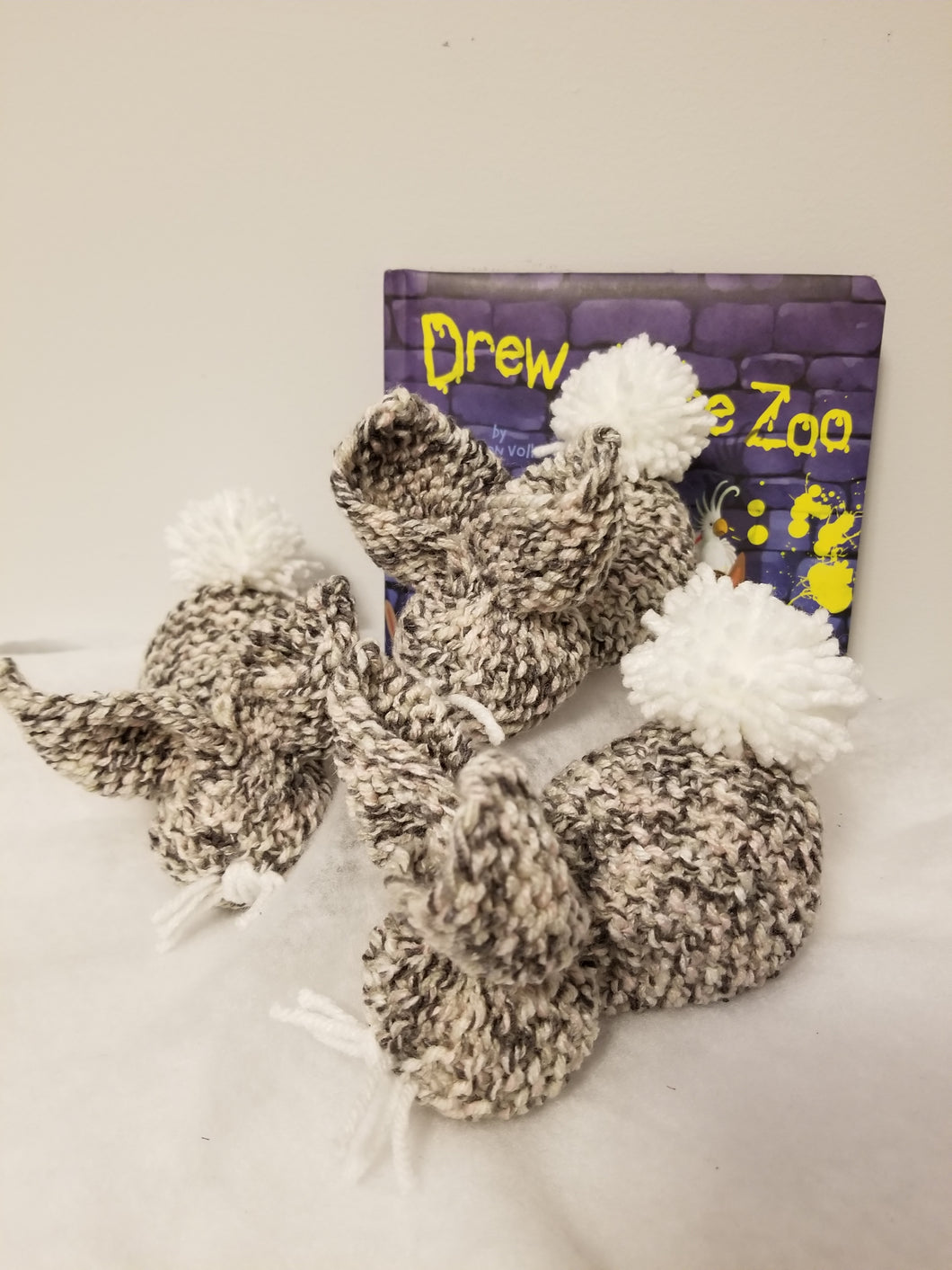 You'll want several of these cute little decorative bunnies. 4-5 inches long; hand knit and hand washable. Great for Easter/spring decoration or to fill a basket.  Bunnies are $10 each or contact Cozy Up via email or Facebook for a special 3 for $25 deal (not available via website)