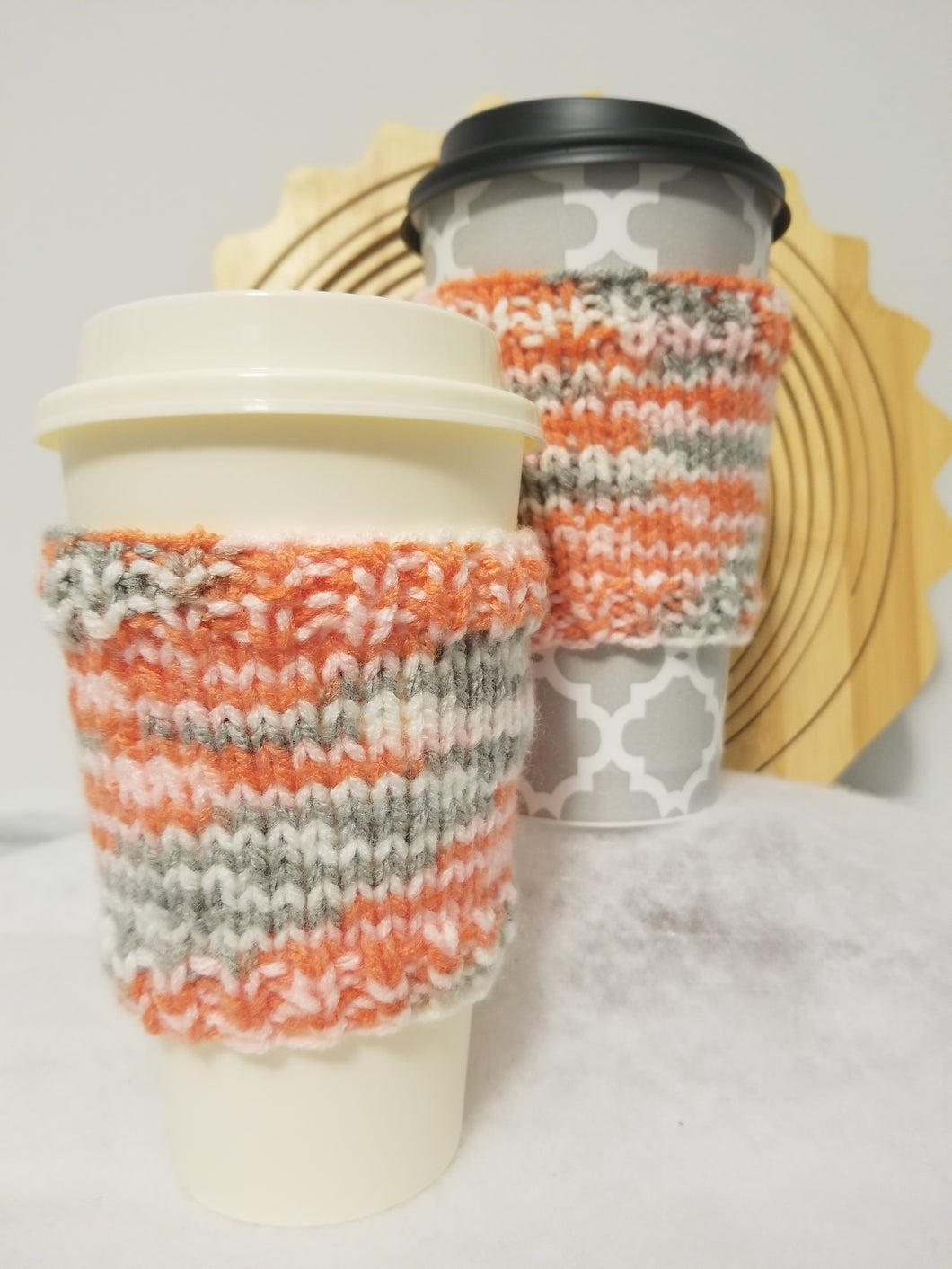 Cup Cuddlers fit 12, 16, 20, & 24 oz cups from your favorite shop, as well as reusable cups. They replace the disposable cardboard sleeve on hot beverages and keep your hands free from moisture and stickiness on cold beverages. Keep several in your car to be ready for that morning drive-thru! Great as gifts; tuck a gift card to your favorite shop inside! Cup Cuddlers are $5 each
