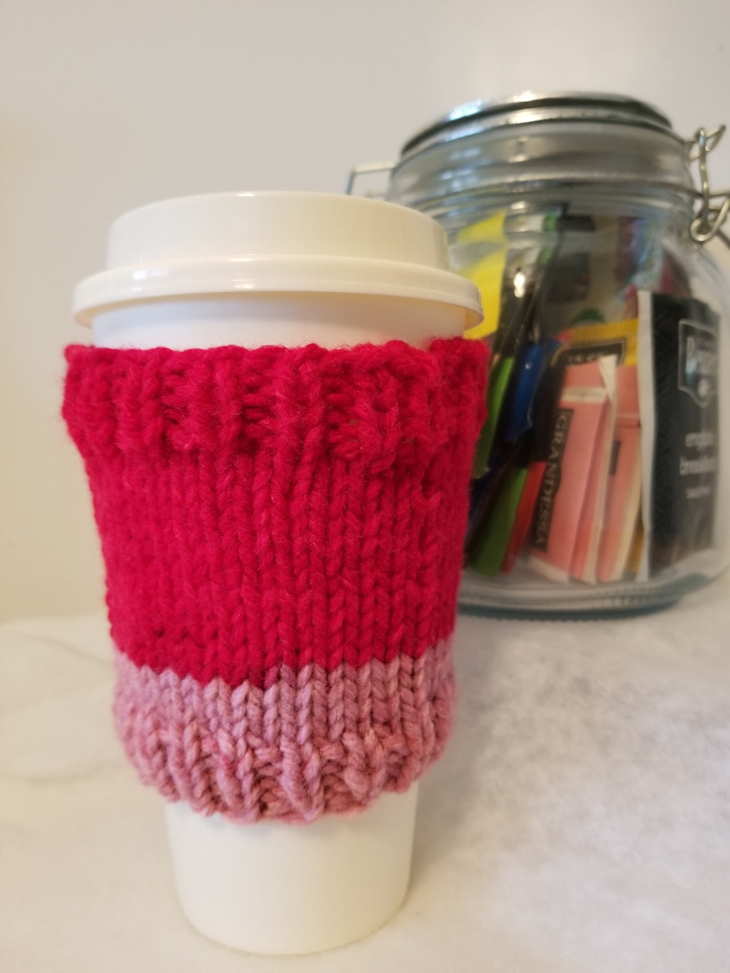 Cup Cuddlers fit 12, 16, 20, & 24 oz cups from your favorite shop, as well as reusable cups. They replace the disposable cardboard sleeve on hot beverages and keep your hands free from moisture and stickiness on cold beverages. Cup Cuddlers are $5 each