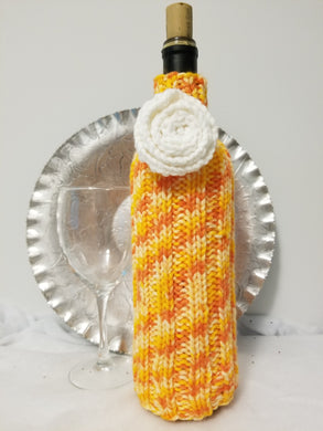 A Party Bottle Cover is a great way to make a gift of wine or spirits extra special. Covers shown on 750 ml bottles but they will stretch to fit a larger bottle with a small amount of the bottle showing at the bottom.  Special orders (team or work colors; shower or wedding gifts) welcome.  Contact Cozy Up via email (CozyUpByClaire@gmail.com) to discuss delivery time.